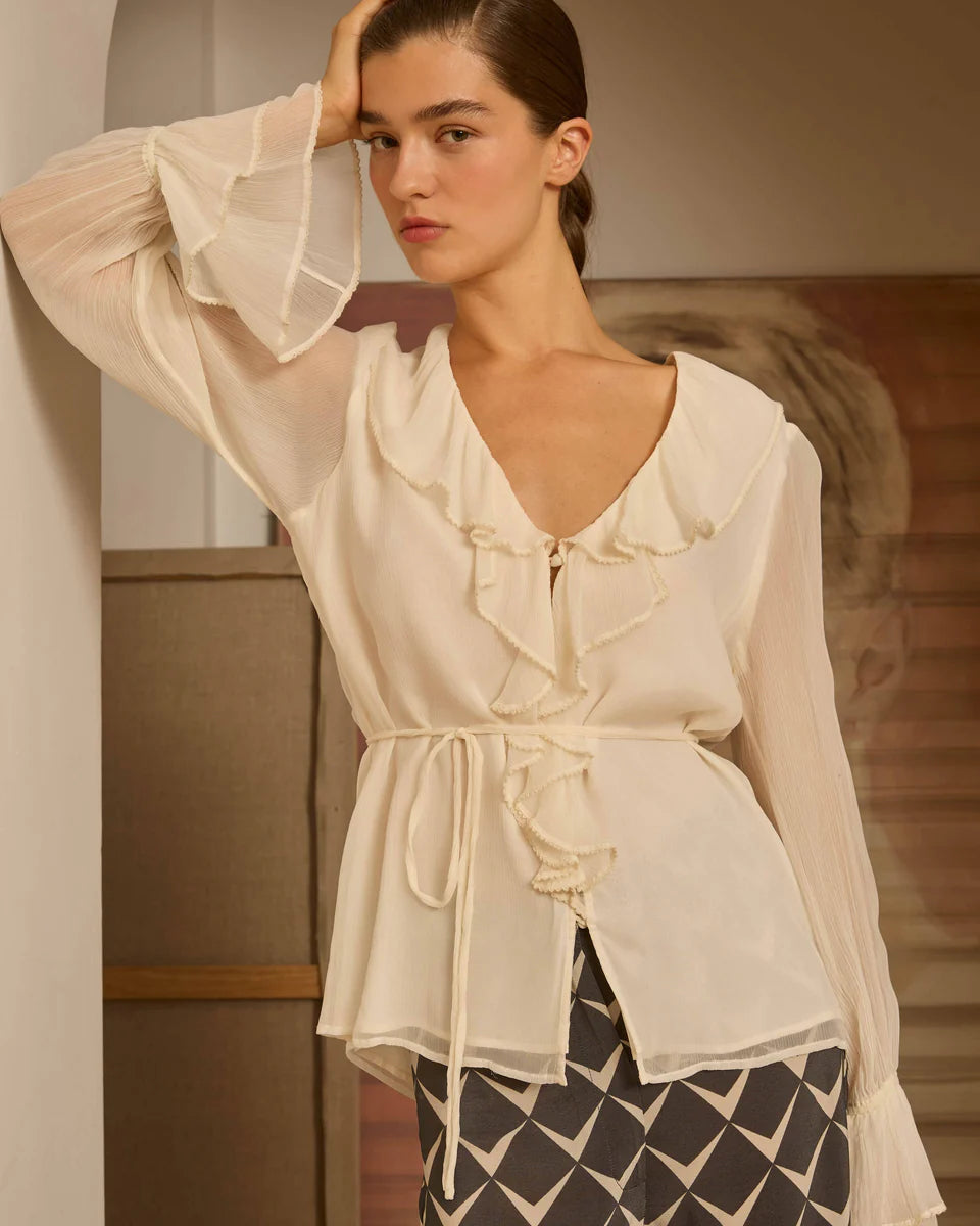 Blusa marfil volantes