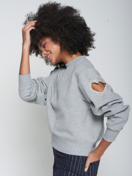 SUDADERA GRIS ABERTURA CORAZÓN PEDRERÍA